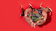 Assorted bulk candies in colorful packaging